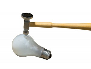 Hitting a light bulb with a hammer